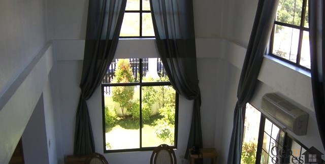 2 storey windows of formal living room